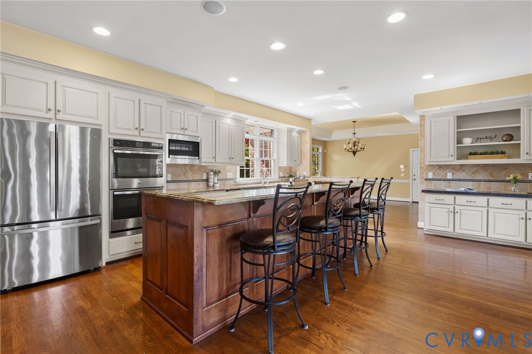 2365 State Rte 635 Midlothian, VA 23113 - Photo 10 of 64 Kitchen featuring a large central island, stainles
