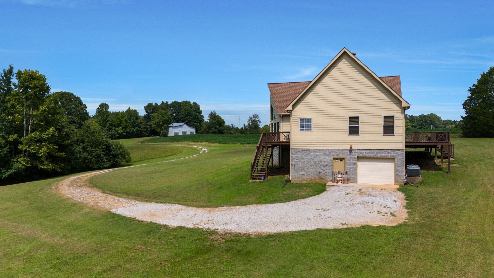 4664 New Cut Road Greenbrier, TN 37073 - Photo 21 of 87 a view of a house with a yard and sitting area