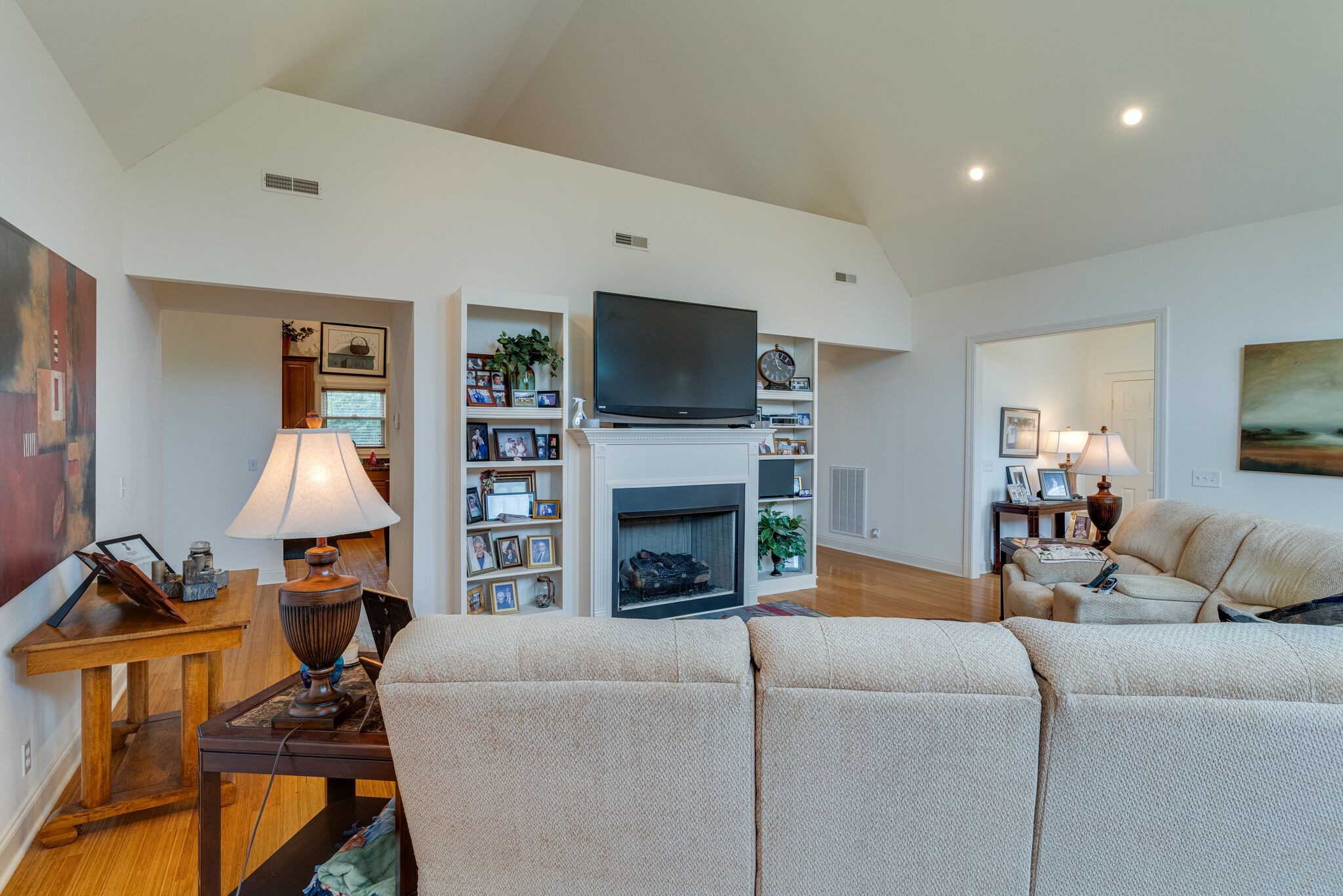 4664 New Cut Road Greenbrier, TN 37073 - Photo 63 of 87 a living room with furniture a fireplace and a flat screen tv