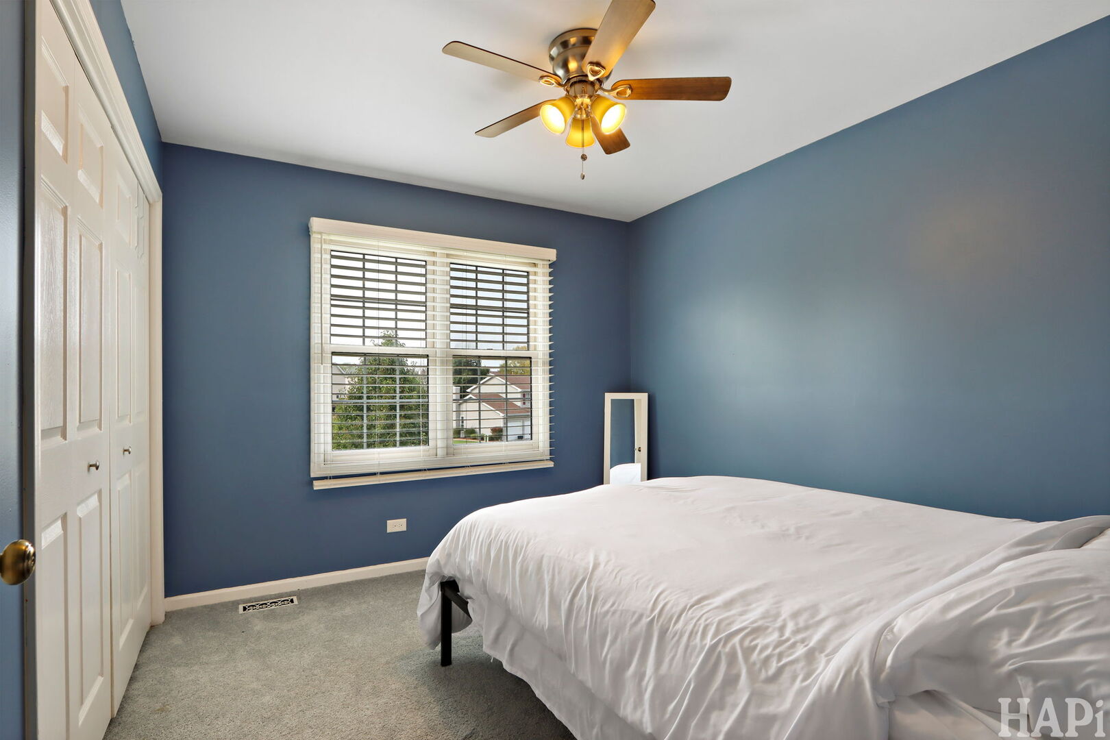 2817 Weld Road Elgin, IL 60124 - Photo 19 of 35 a bed sitting in a bedroom next to a window