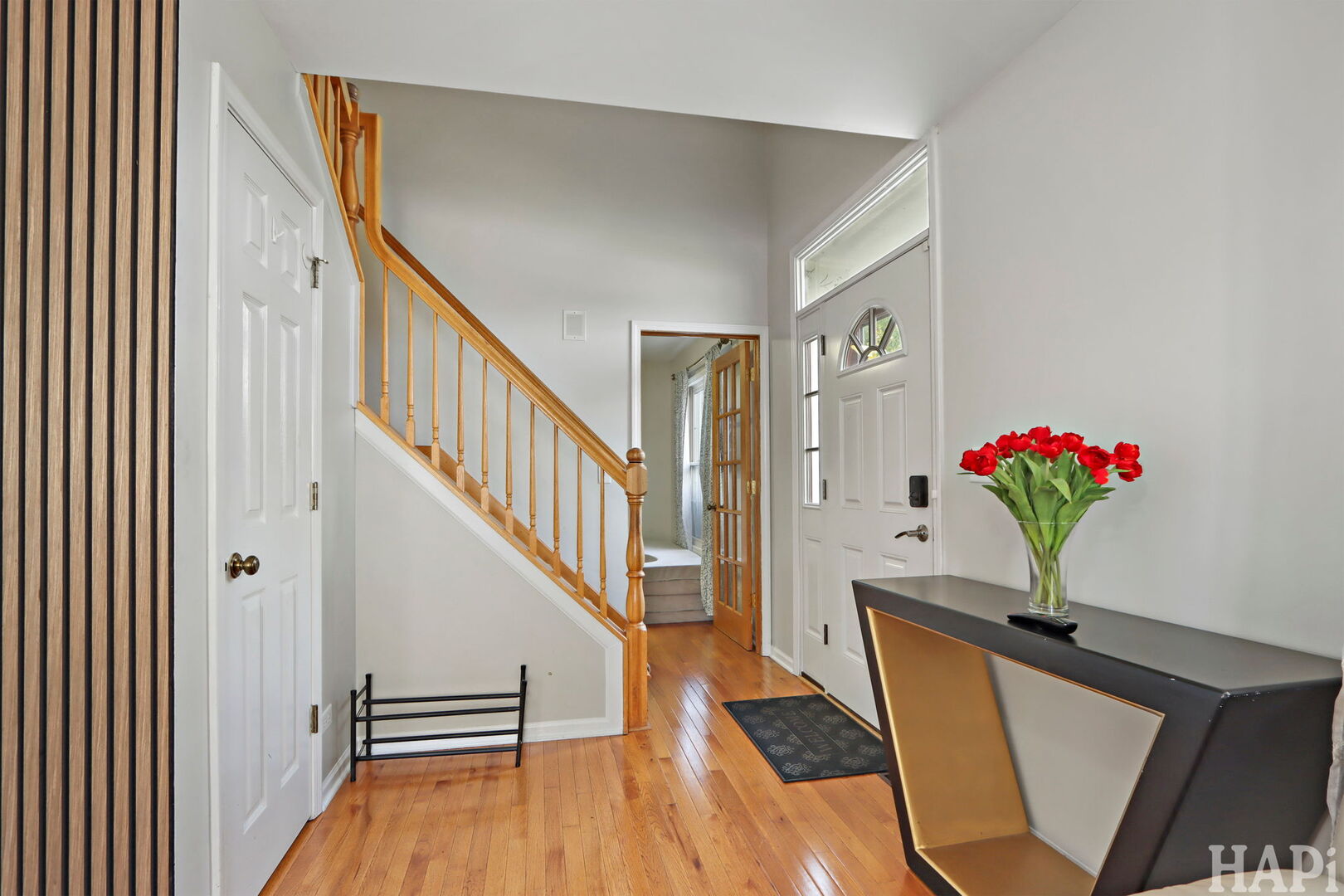 2817 Weld Road Elgin, IL 60124 - Photo 3 of 35 a view of entryway and hall with wooden floor
