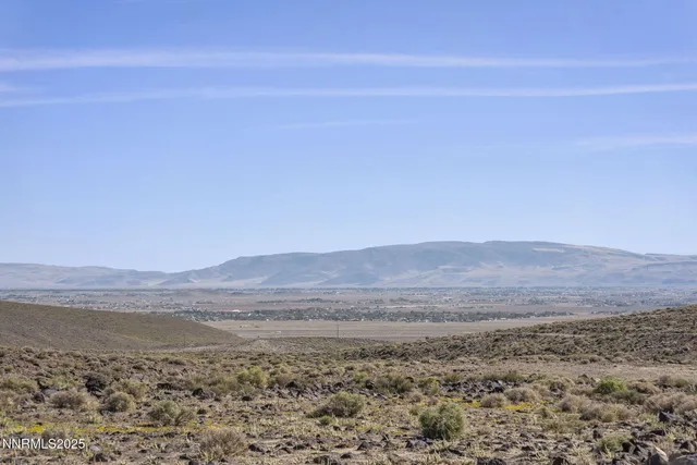 a view of mountain with lake view
