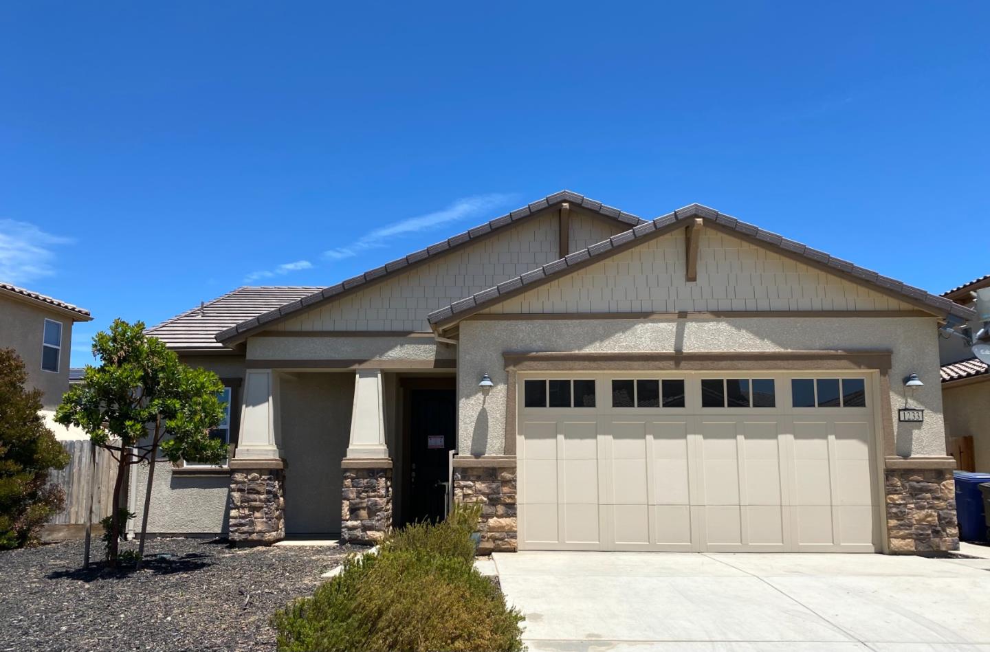 1233 La Colina Street Soledad, CA 93960 - Photo 1 of 10 a front view of a house with a yard