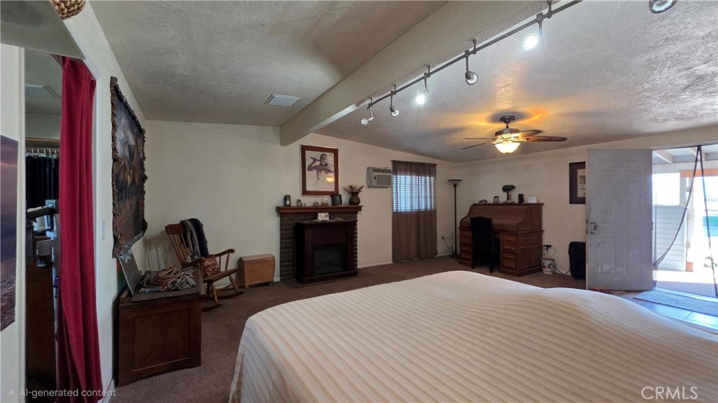 47527 Silver Valley Road Newberry Springs, CA 92365 - Photo 14 of 70 Large master with access to enclosed patio and backyard area