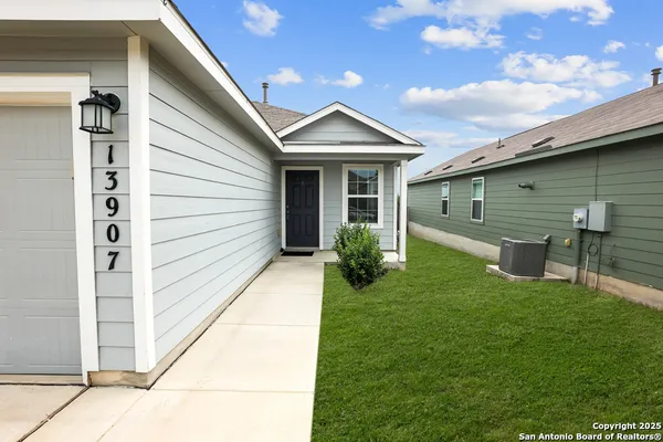 a view of a back yard of the house