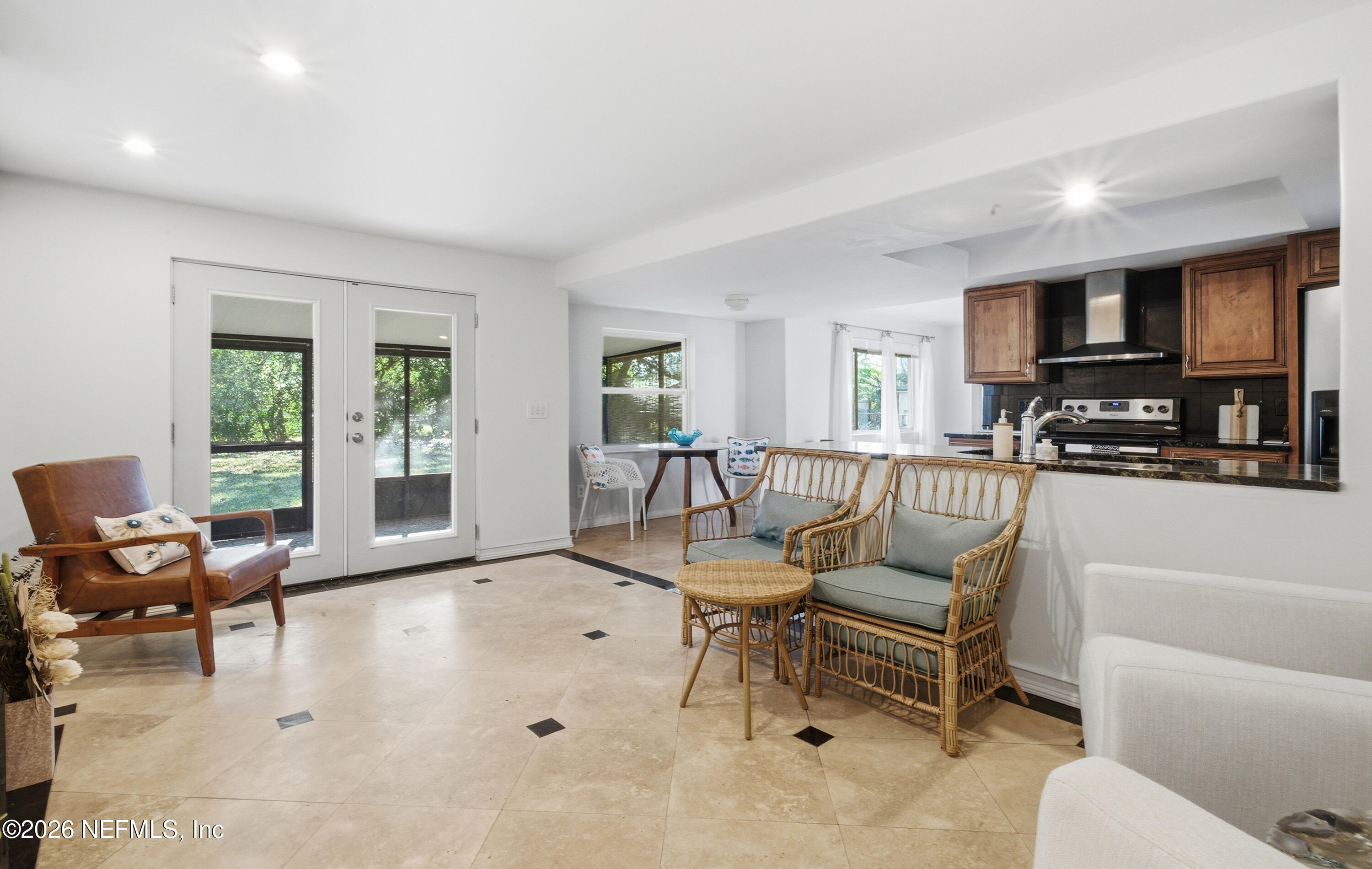 147 Knight Boxx Road Middleburg, FL 32068 - Photo 11 of 30 a living room with furniture and a flat screen tv