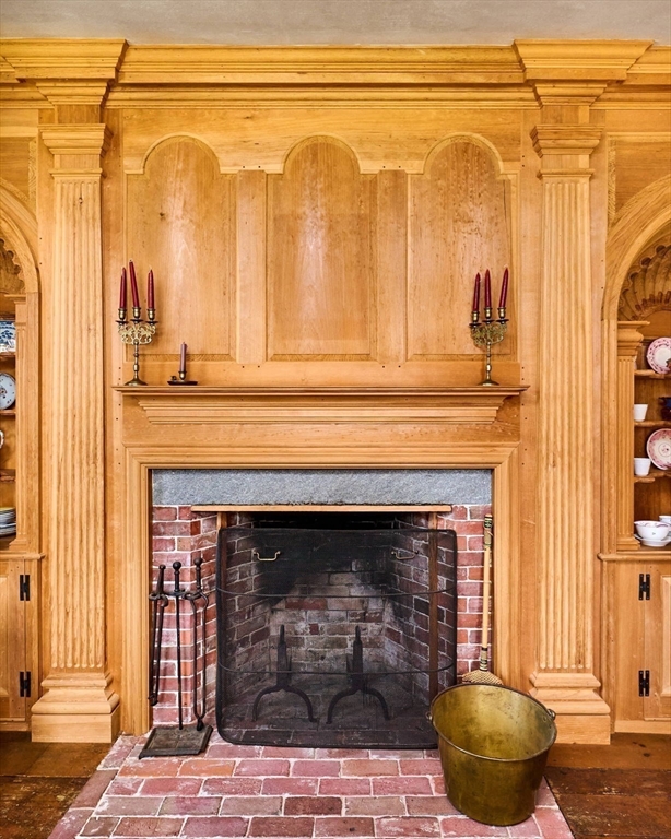 24 West Oxbow Road Charlemont, MA 01370 - Photo 12 of 29 a living room with a fireplace and a wooden floor