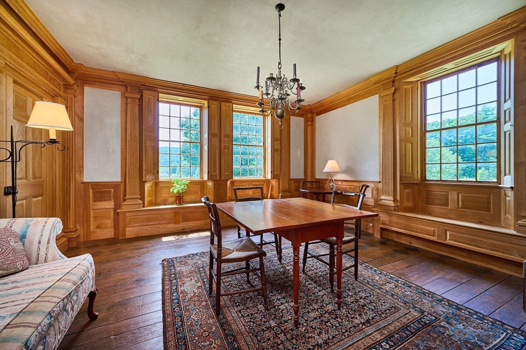 24 West Oxbow Road Charlemont, MA 01370 - Photo 9 of 29 a view of a livingroom with furniture window and wooden floor