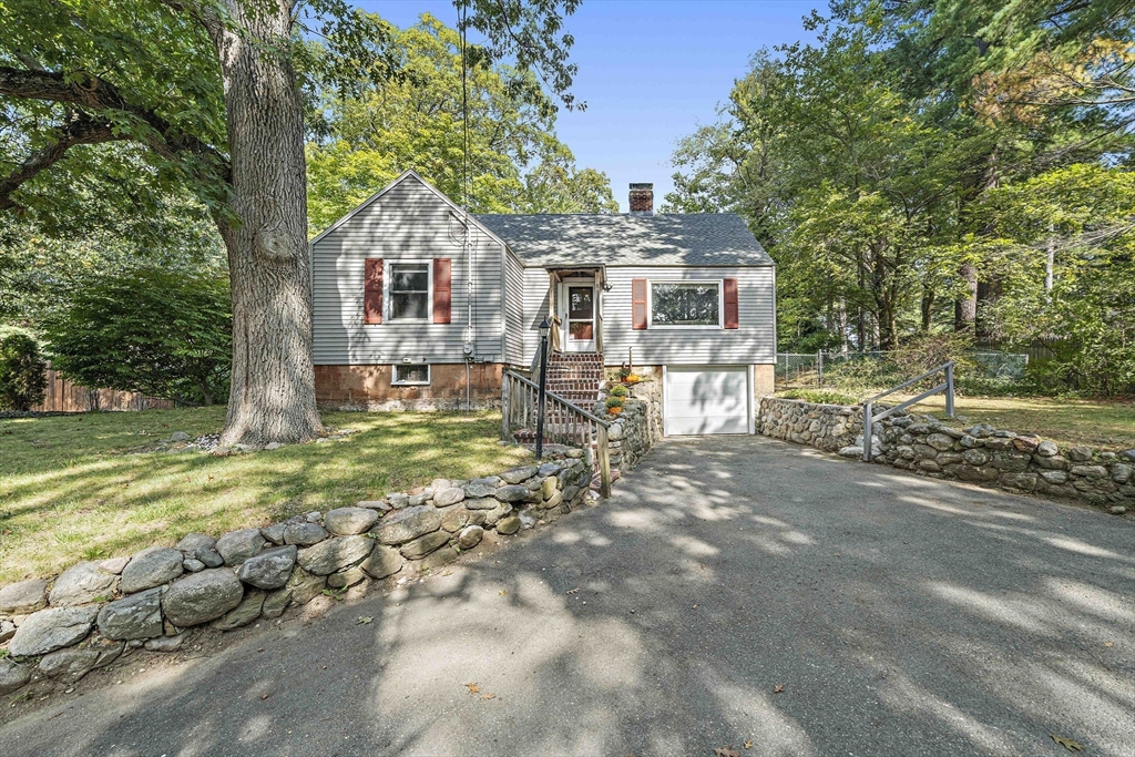 8 Elginwood Road Peabody, MA 01960 - Photo 1 of 25 a front view of a house with garden