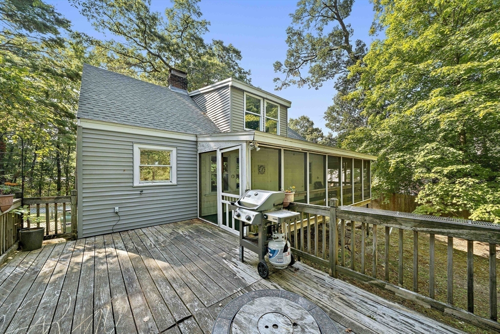 8 Elginwood Road Peabody, MA 01960 - Photo 14 of 25 a balcony with wooden floor and furniture
