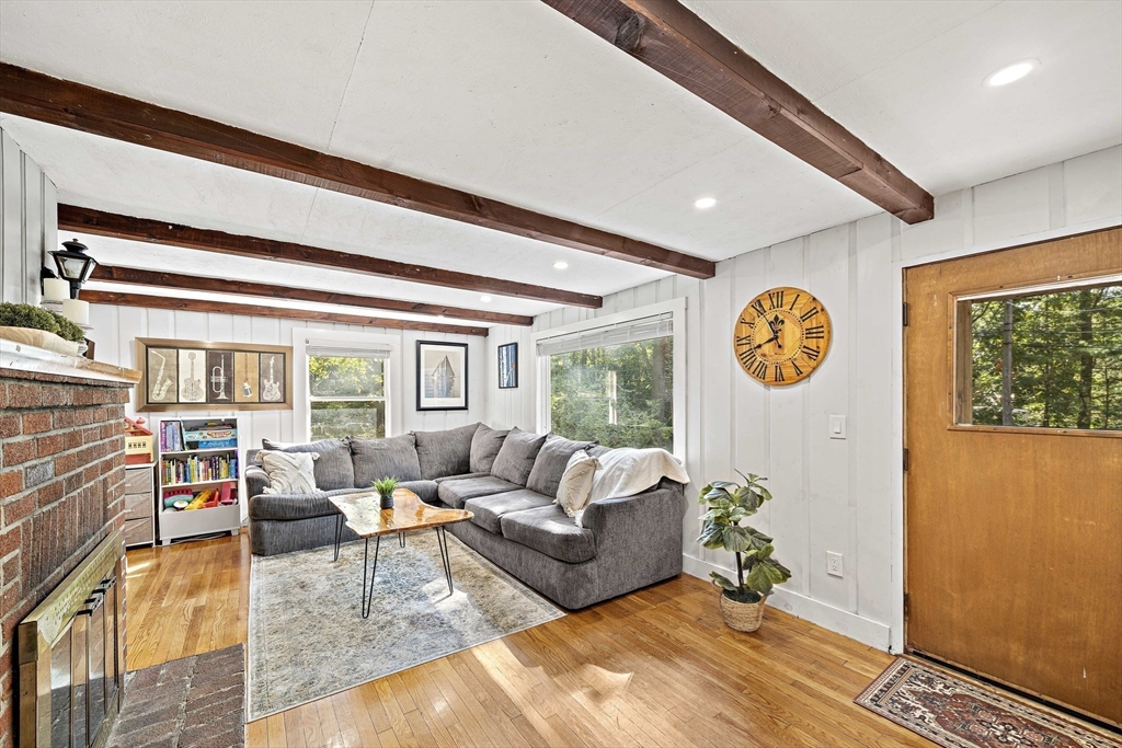 8 Elginwood Road Peabody, MA 01960 - Photo 3 of 25 a living room with furniture and a large window