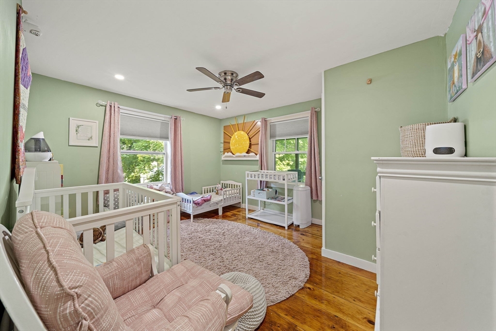 8 Elginwood Road Peabody, MA 01960 - Photo 9 of 25 a living room with furniture and a large window