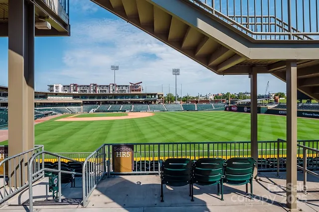 a view of a patio with a table chairs and a table