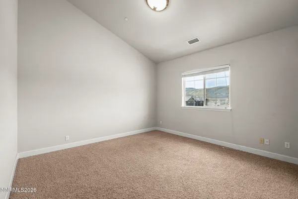 a bathroom with a sink a shower and a mirror