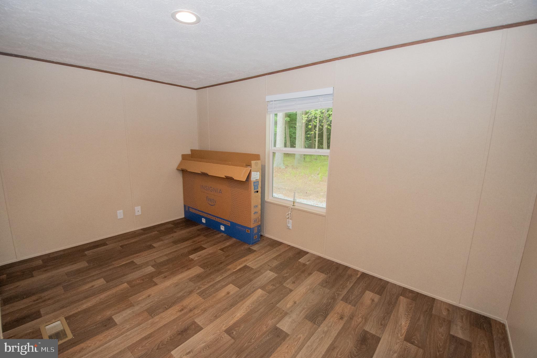 21449 Nanticoke Road Tyaskin, MD 21865 - Photo 8 of 14 a view of an empty room with a window