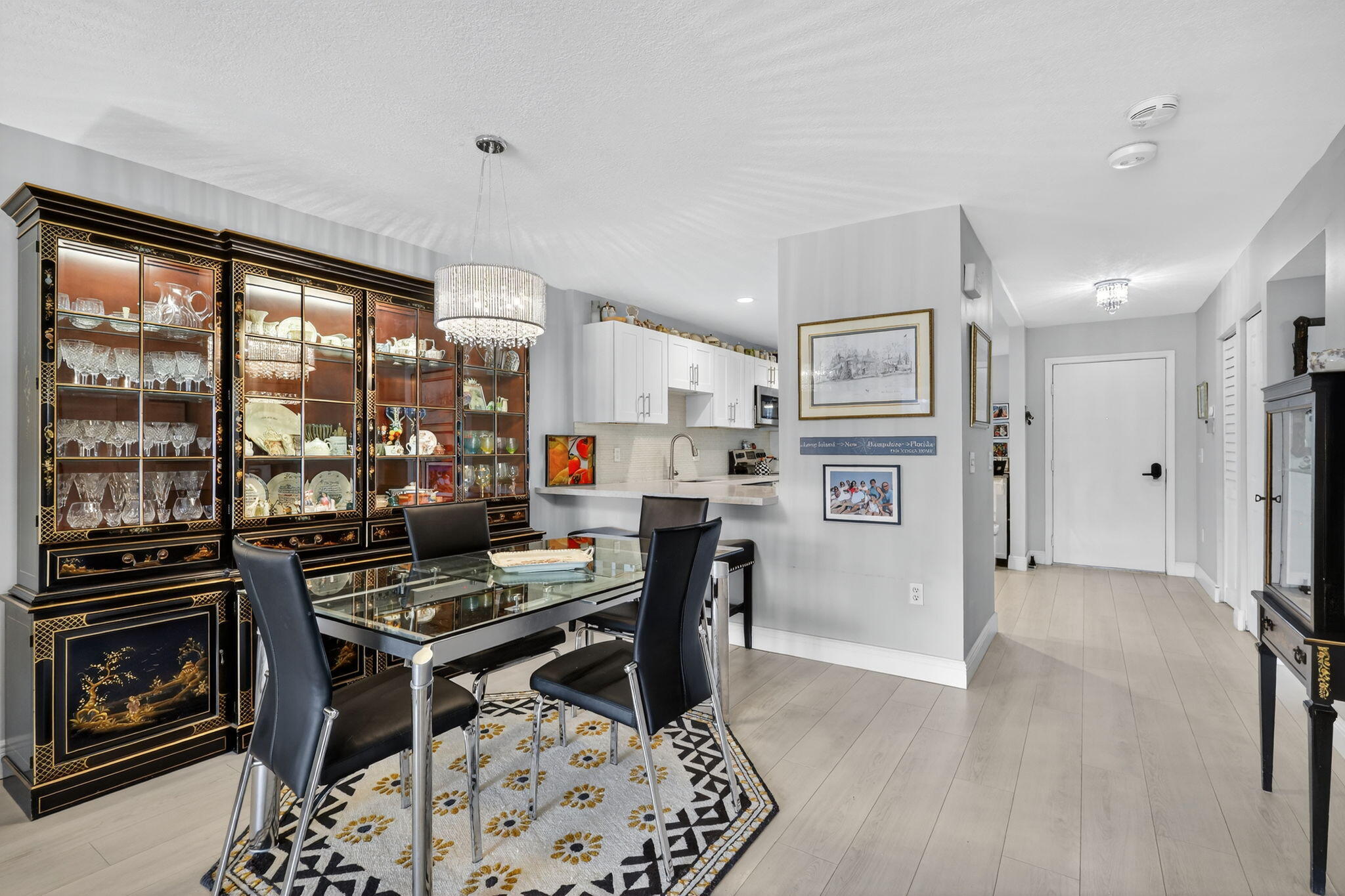 36 Southport Lane, Unit C Boynton Beach, FL 33436 - Photo 32 of 69 a kitchen with stainless steel appliances kitchen island granite countertop a refrigerator and a stove top oven