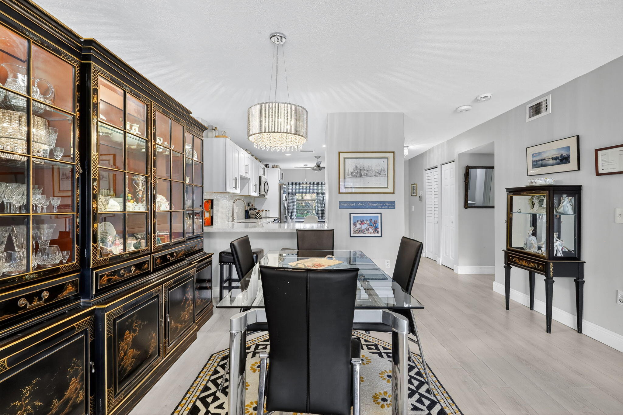 36 Southport Lane, Unit C Boynton Beach, FL 33436 - Photo 33 of 69 a view of a dining room with furniture window and wooden floor