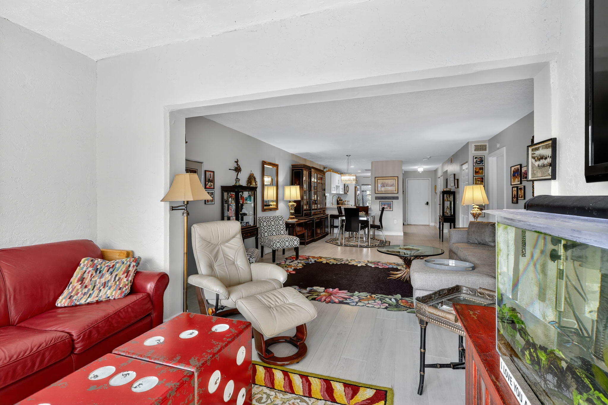 36 Southport Lane, Unit C Boynton Beach, FL 33436 - Photo 34 of 69 a living room with furniture and a wooden floor