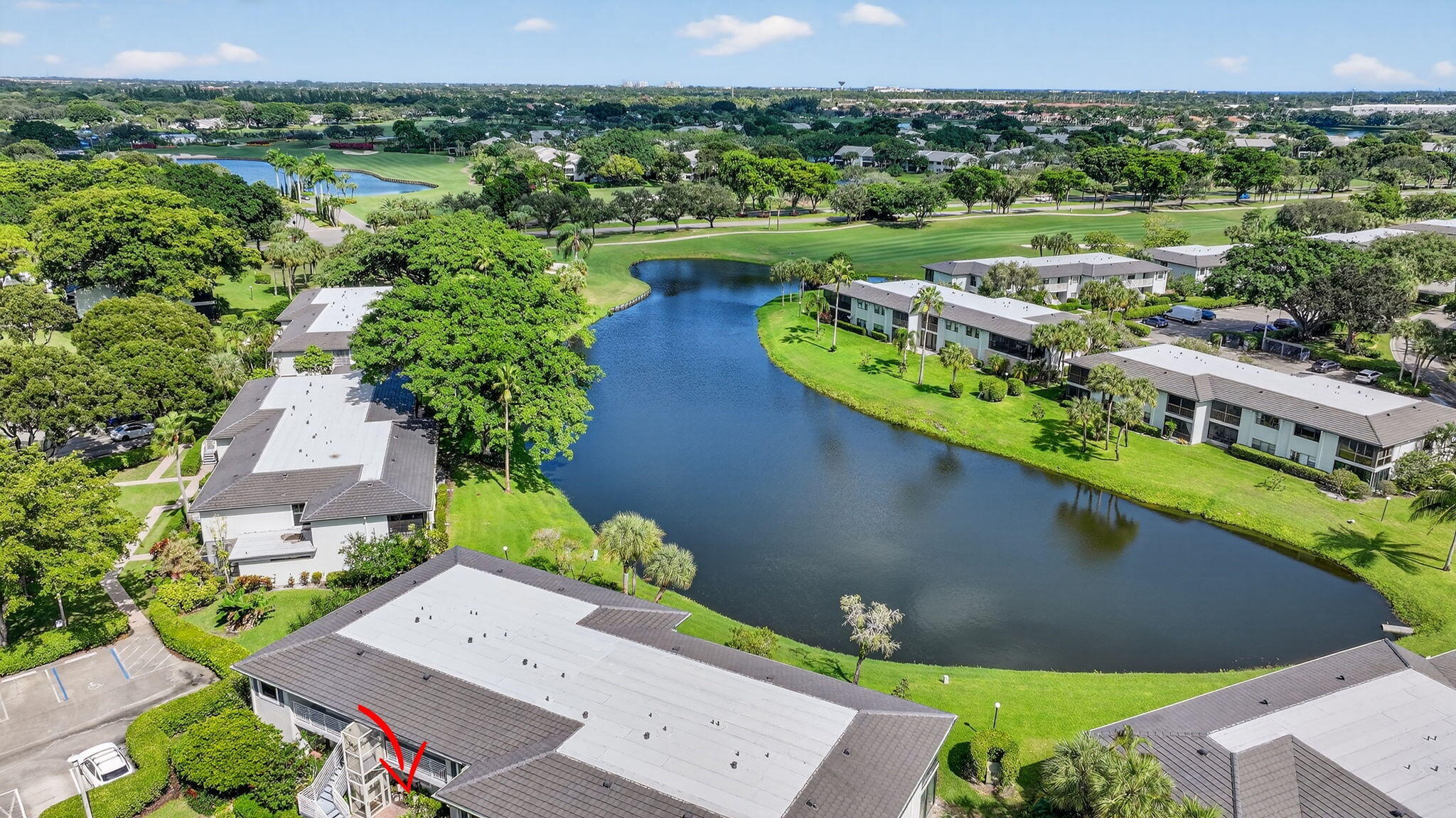 36 Southport Lane, Unit C Boynton Beach, FL 33436 - Photo 43 of 69 an aerial view of a house with a garden