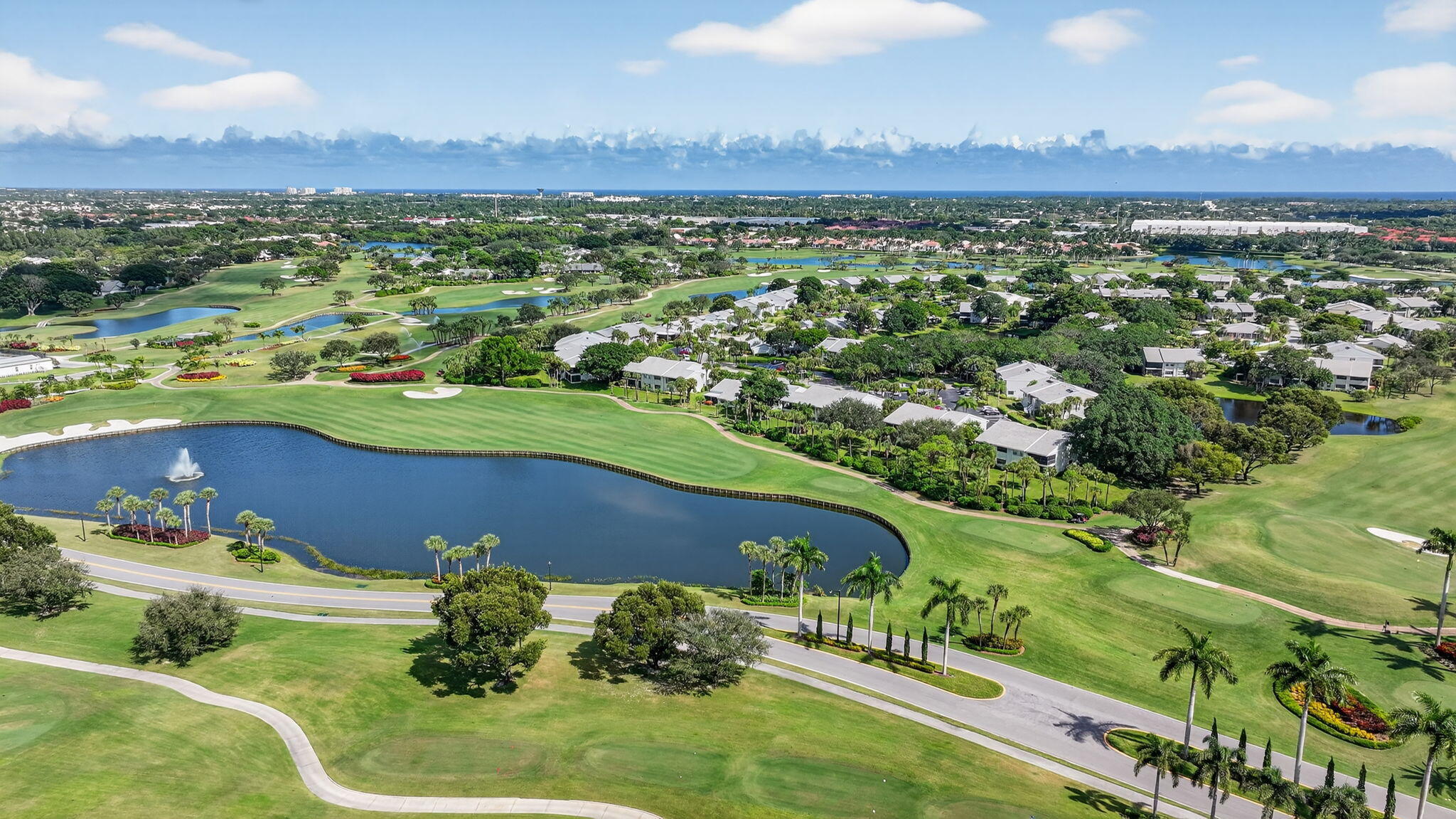 36 Southport Lane, Unit C Boynton Beach, FL 33436 - Photo 44 of 69 an aerial view of a house with a yard