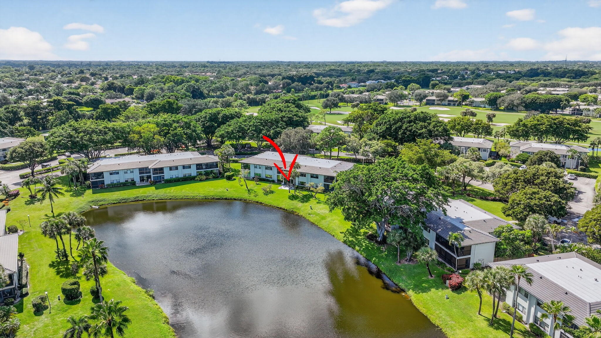 36 Southport Lane, Unit C Boynton Beach, FL 33436 - Photo 45 of 69 an aerial view of a houses with a swimming pool
