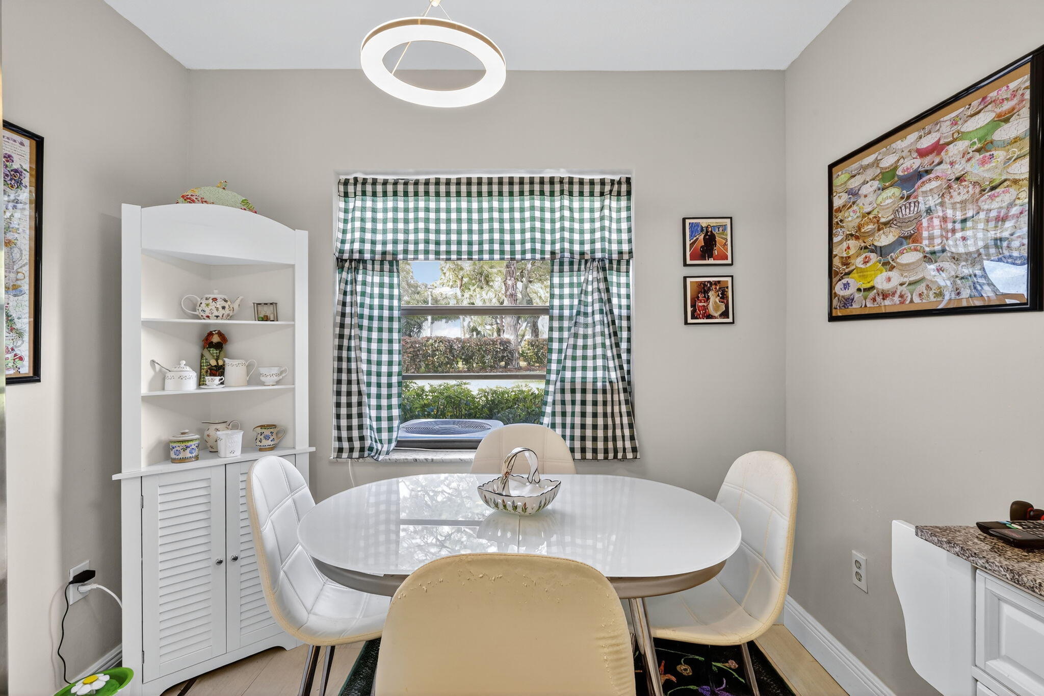 36 Southport Lane, Unit C Boynton Beach, FL 33436 - Photo 7 of 69 a view of a dining room with furniture window and outside view