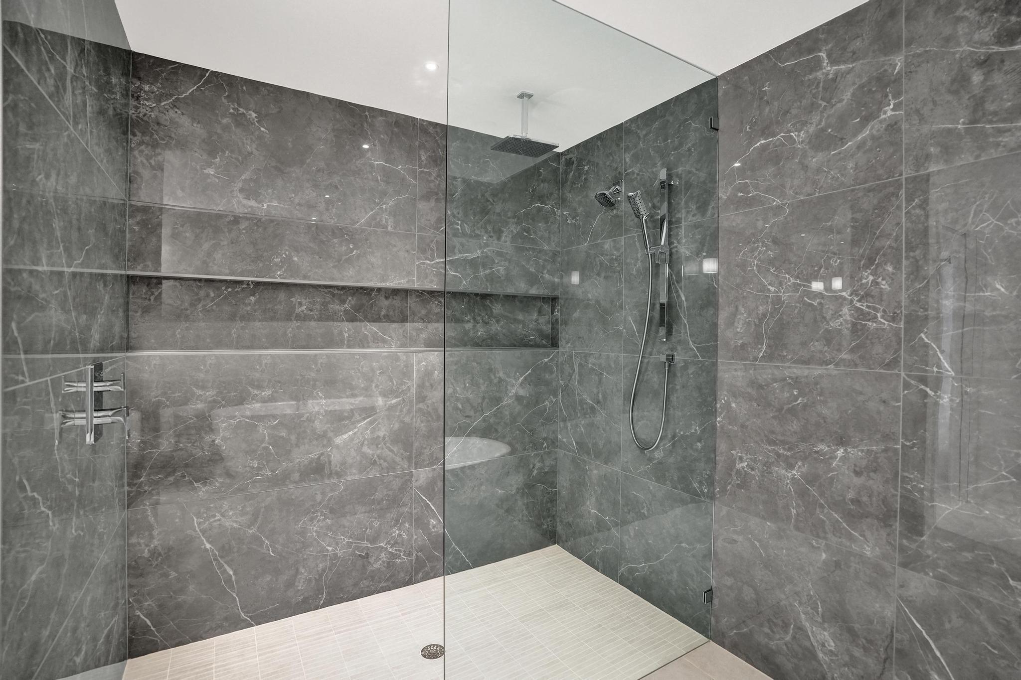 407 North Riverside Drive, Unit 602 Pompano Beach, FL 33062 - Photo 28 of 83 a bathroom with a shower