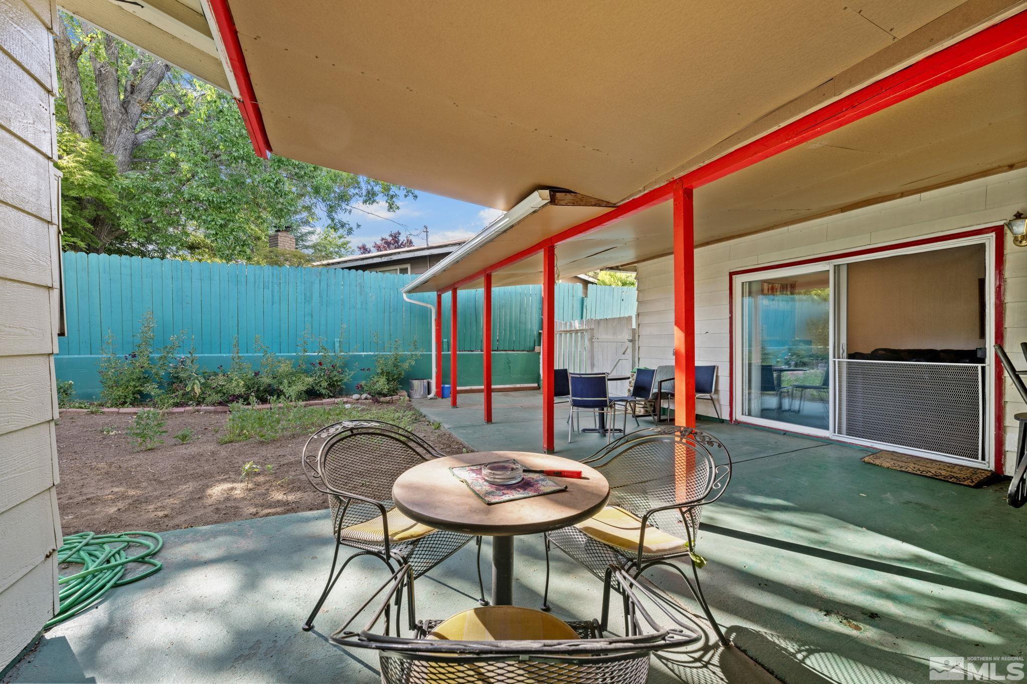 1800 Prince Way Reno, NV 89503 - Photo 36 of 40 a backyard of a house with table and chairs