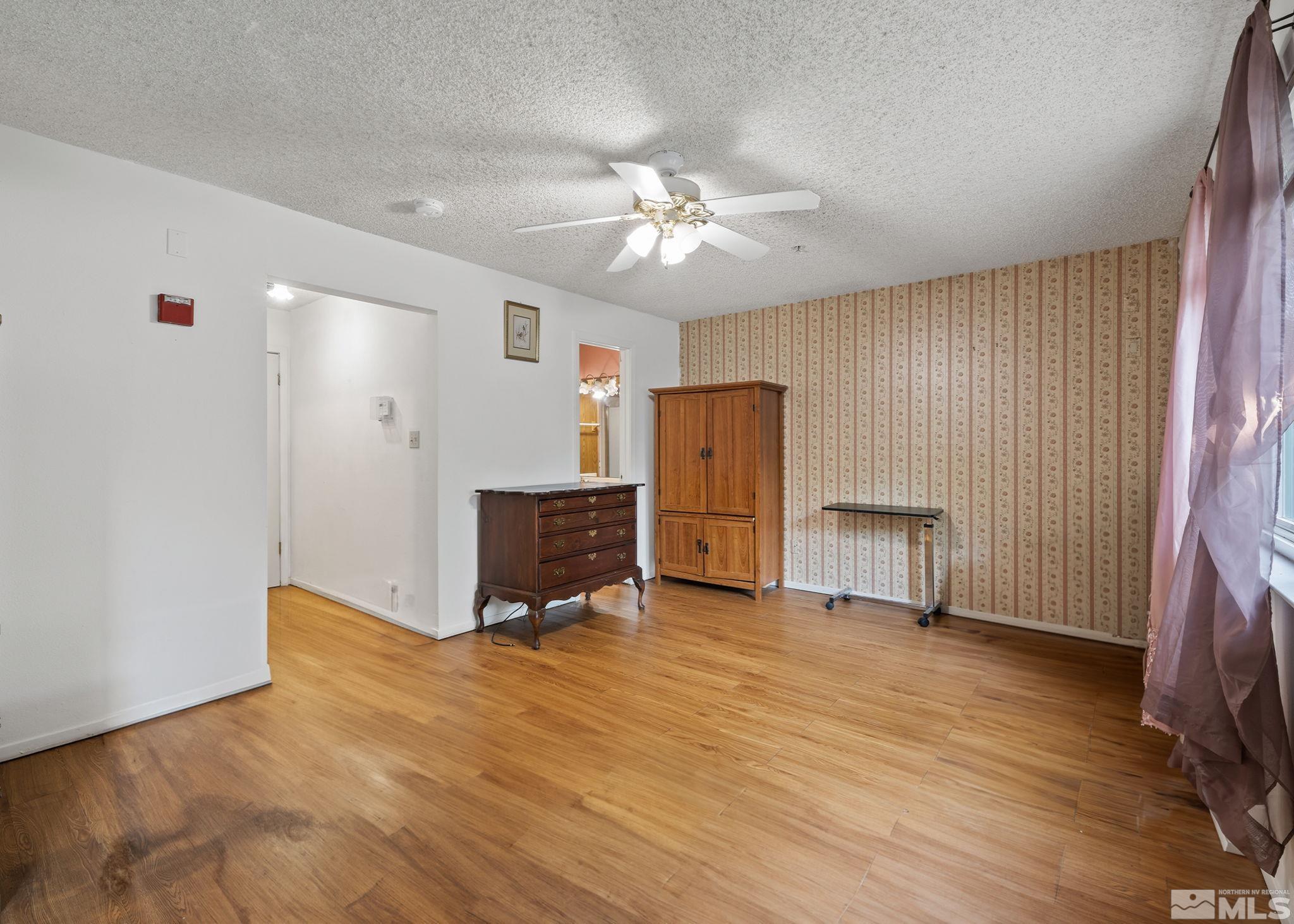 1800 Prince Way Reno, NV 89503 - Photo 8 of 40 a view of kitchen with refrigerator cabinet and a ceiling fan