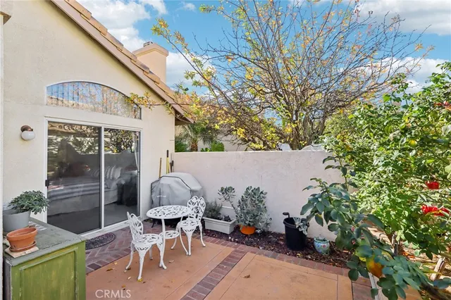 a outdoor living space with furniture and garden view