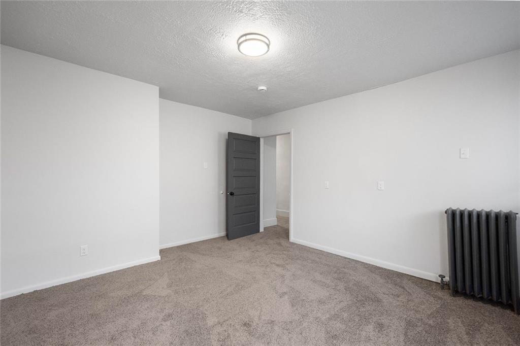 306 Park Road Ambridge, PA 15003 - Photo 17 of 43 a view of an empty room