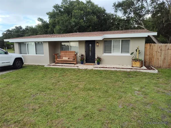 a house view with a garden space