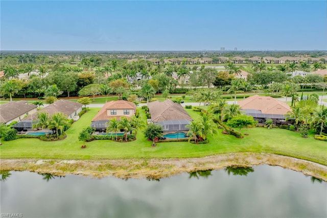 a view of a lake with a building in the background
