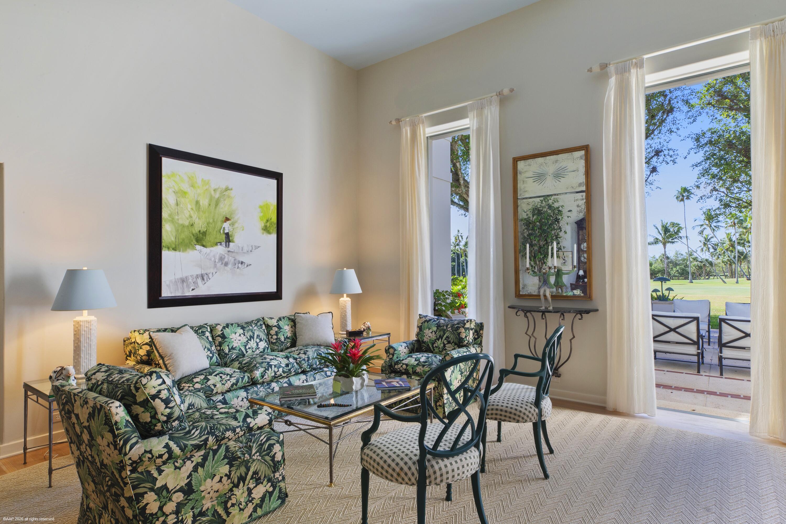 30 Gomez Road Jupiter Island, FL 33455 - Photo 12 of 30 a living room with furniture and a painting on the wall
