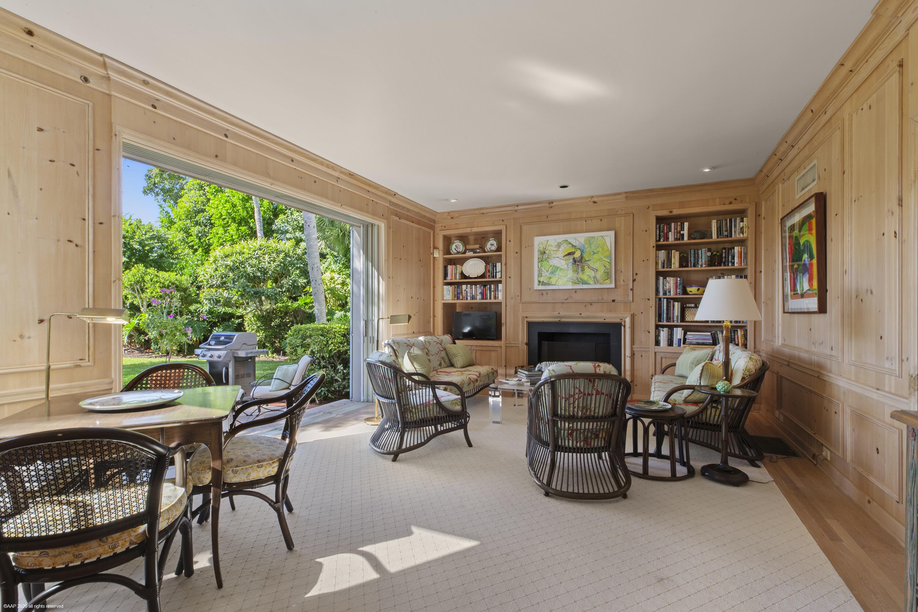 30 Gomez Road Jupiter Island, FL 33455 - Photo 14 of 30 a living room with furniture a fireplace and a large window