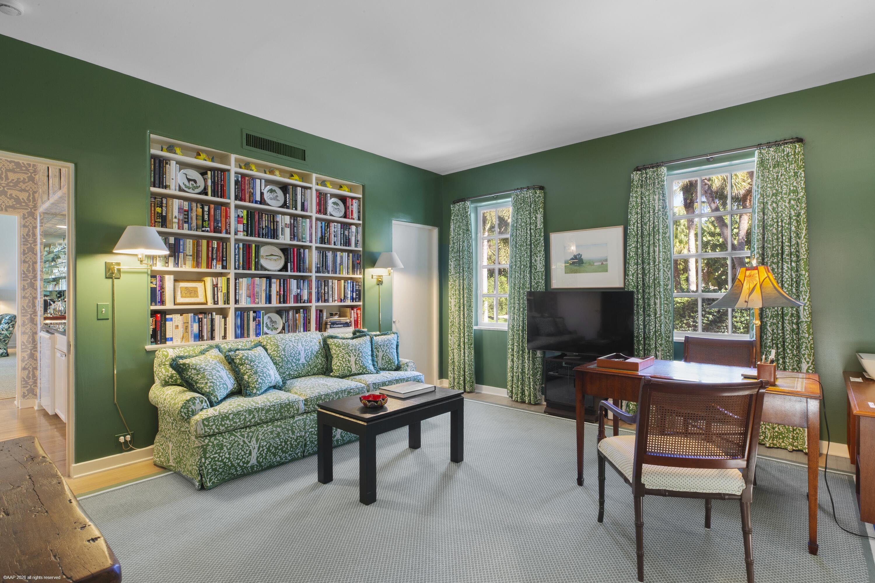 30 Gomez Road Jupiter Island, FL 33455 - Photo 19 of 30 a living room with furniture and a book shelf
