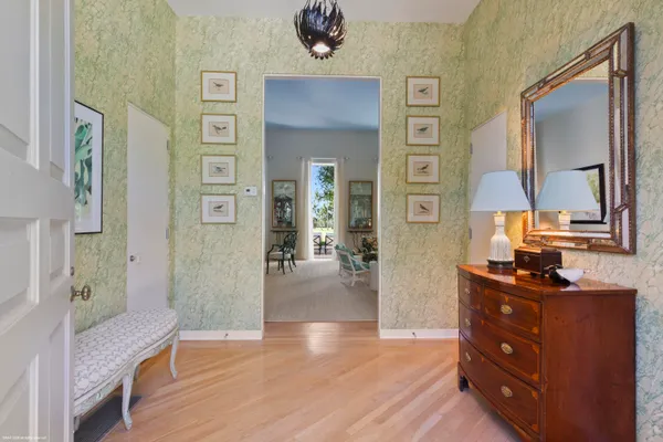 a view of a bedroom from a hallway