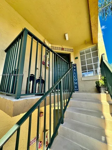 a view of stairs and with wooden floor