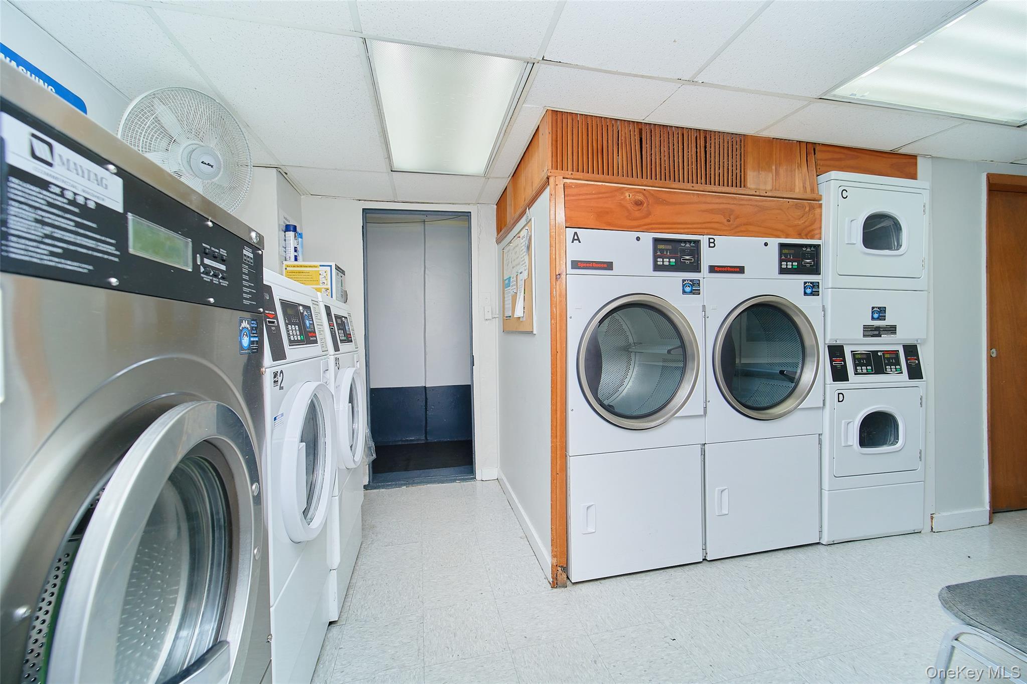 2962 Decatur Avenue, Unit 4D Bronx, NY 10458 - Photo 20 of 21 a utility room with dryer and washer