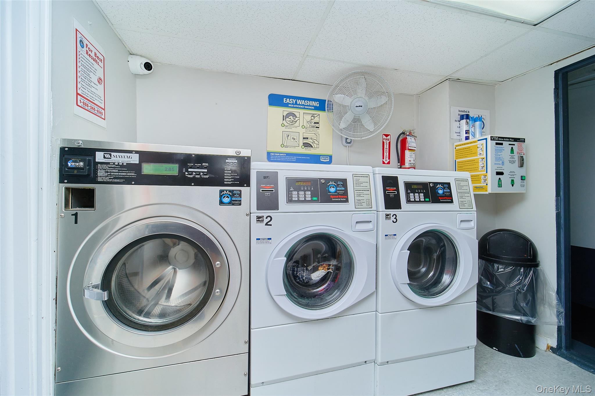 2962 Decatur Avenue, Unit 4D Bronx, NY 10458 - Photo 21 of 21 a utility room with dryer and washer
