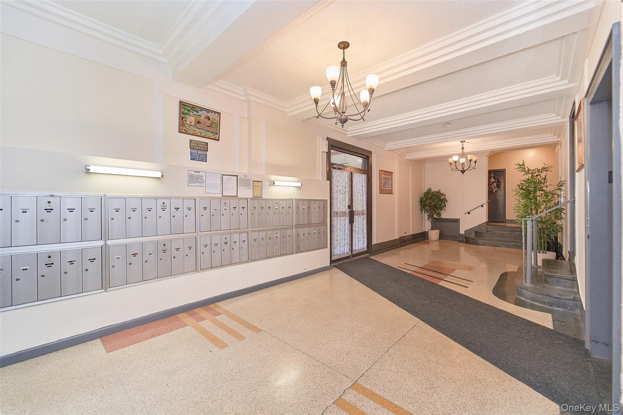 2962 Decatur Avenue, Unit 4D Bronx, NY 10458 - Photo 5 of 21 a view of a lobby with black carpet