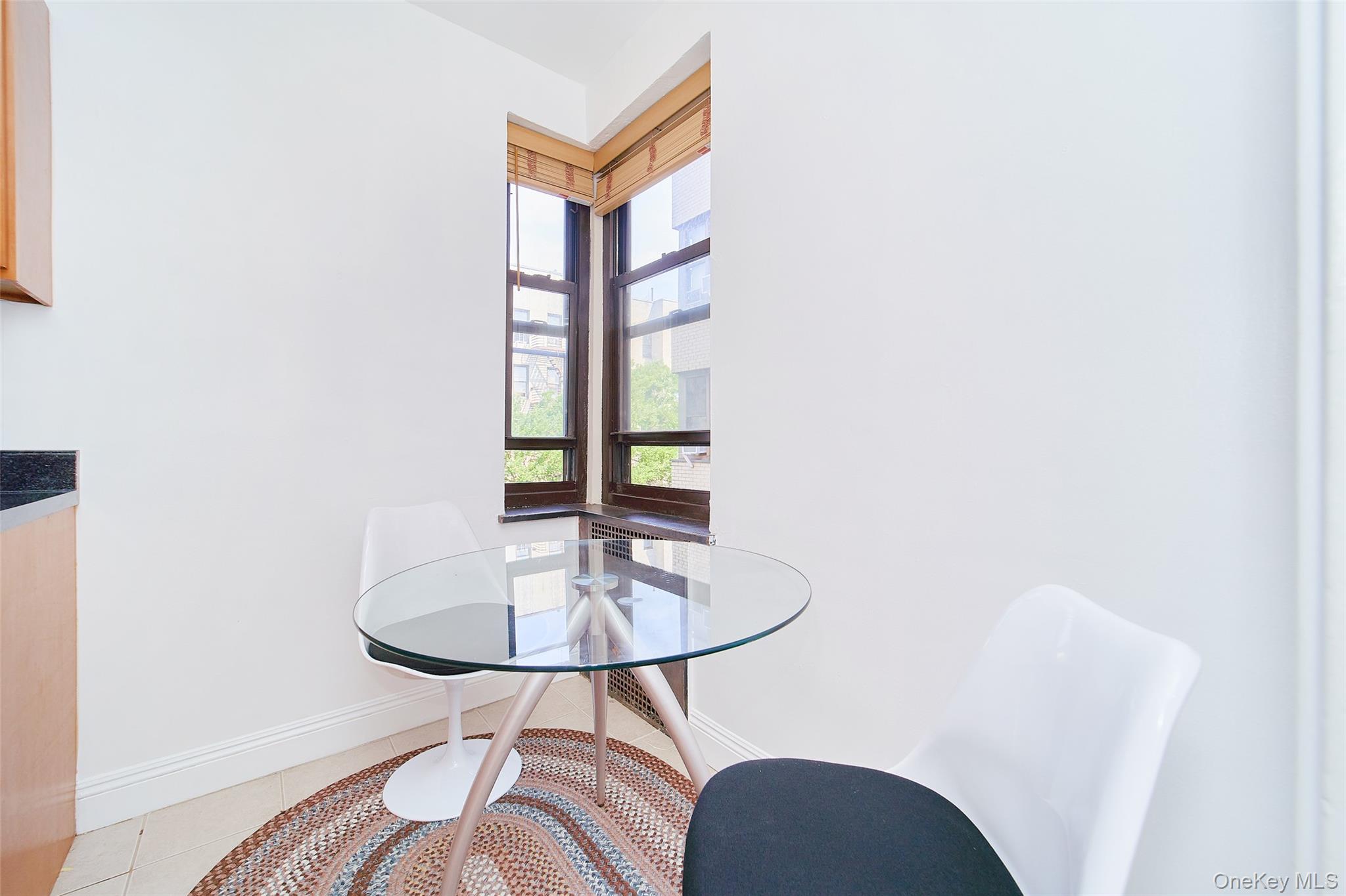 2962 Decatur Avenue, Unit 4D Bronx, NY 10458 - Photo 10 of 21 a bathroom with a sink and a mirror