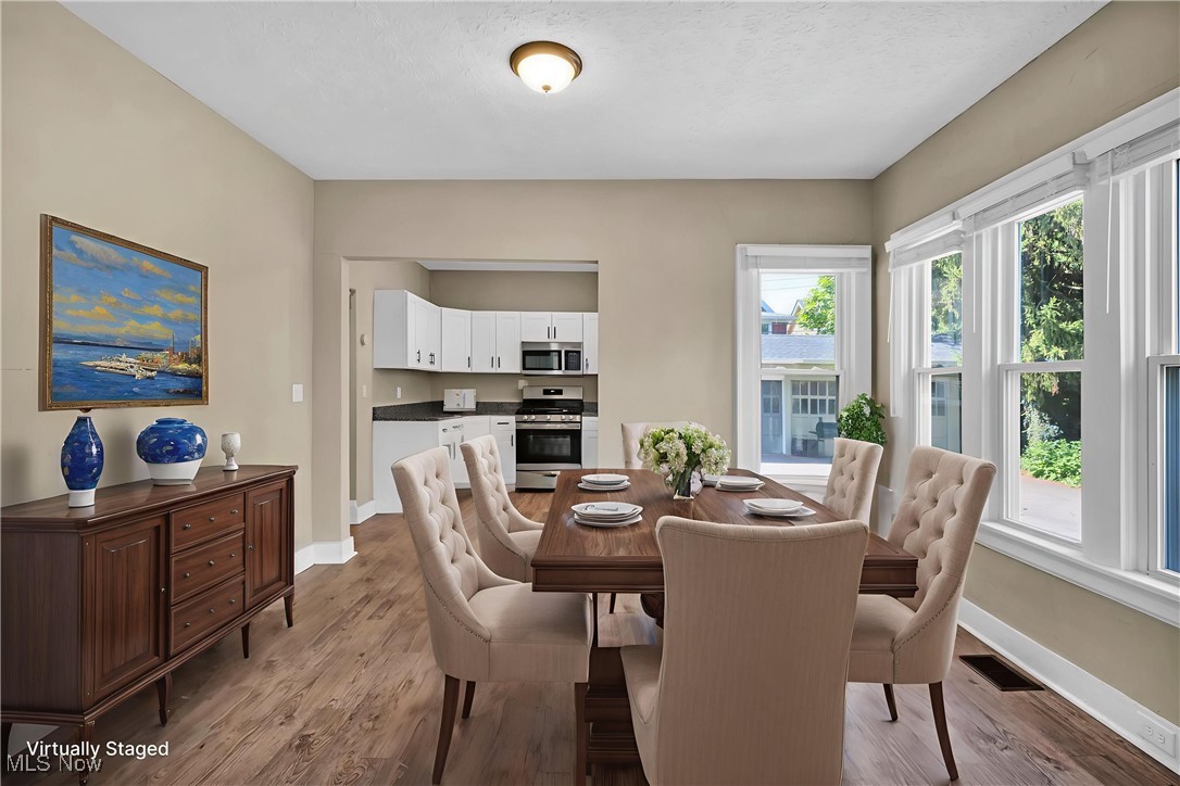 3312 Redwood Road Cleveland Heights, OH 44118 - Photo 12 of 28 Dining room with light wood finished floors and baseboards