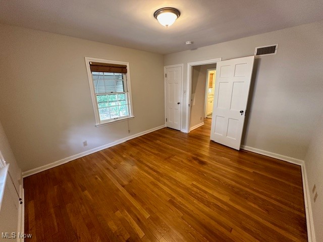 4065 Conover Road Cleveland, OH 44118 - Photo 15 of 24 Unfurnished bedroom with hardwood / wood-style flooring