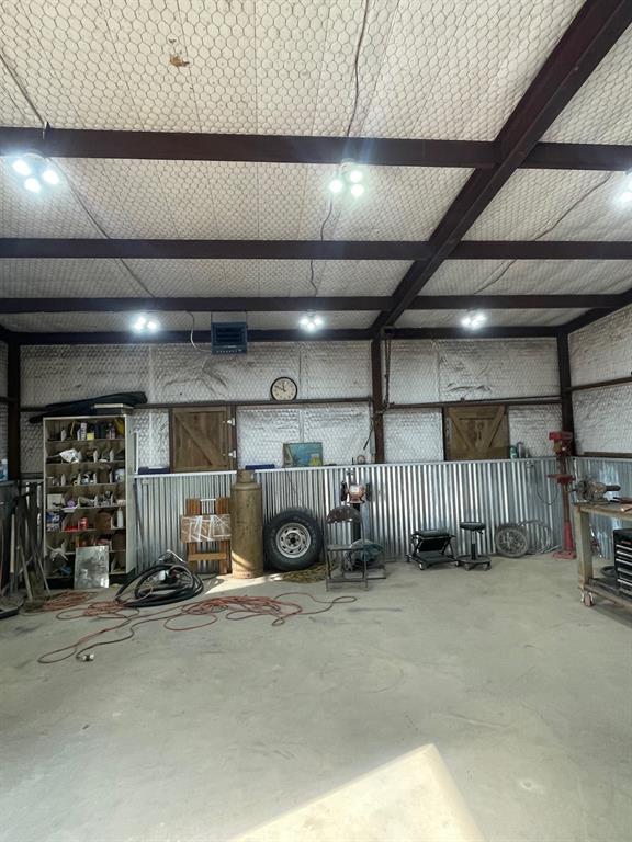 139 HCR 2105 Loop North Whitney, TX 76692 - Photo 4 of 16 a view of parking garage with cars
