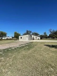a front view of a building with lake view