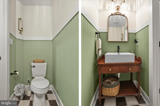 a bedroom with a bed and a dresser next to a window