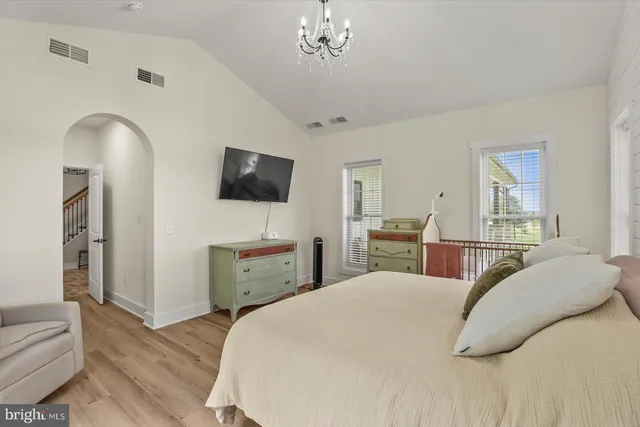 a view of hall way with furniture