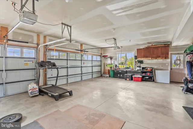 a view of a garage with gym equipment