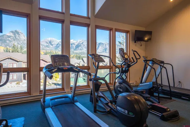 a view of a room with gym equipment